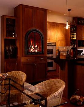 Chelsea by Mendota gas fireplace in kitchen with table in foreground