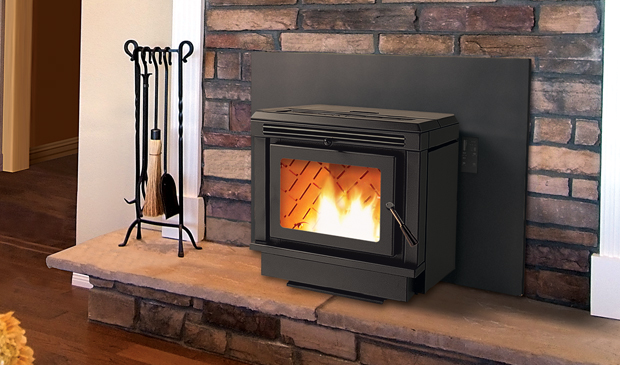 Enviro  pellet stove with stone surround and hearth - tools to the left